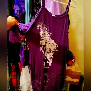 Spagetti strap peek a boo sleeve with purple lace